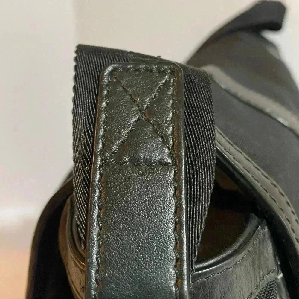Burberry  Unsex nylon leather trimmed messenger bag